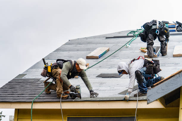 Professional Gutter Installation technician working in Millville, CA